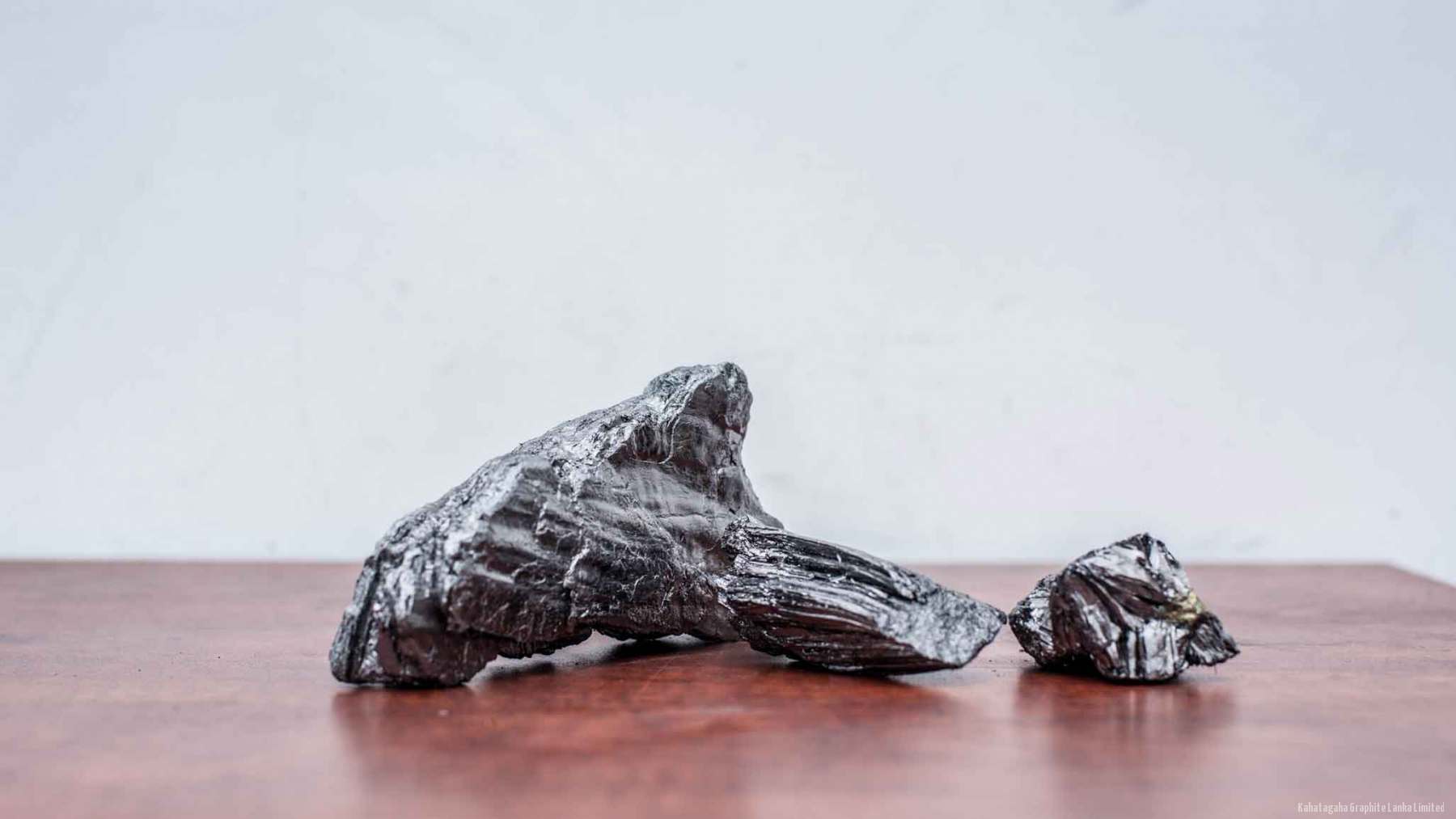 A large specimen of crystalline vein graphite showing its layered structure.
